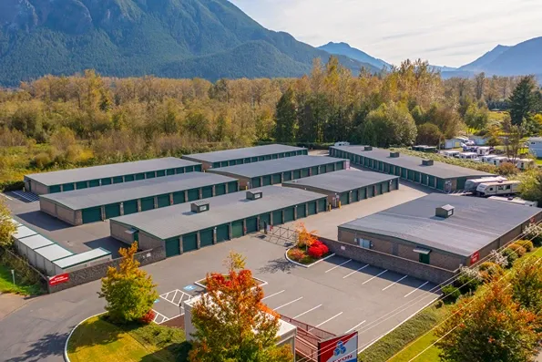 Drive-up storage units with wide access lanes and parking at Devon Self Storage facility