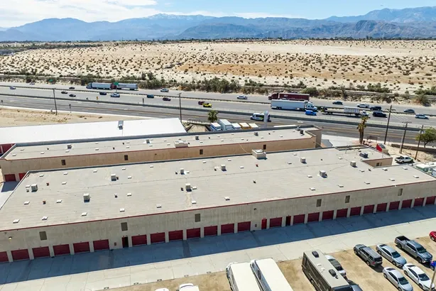 Aerial view of facility with drive up units
