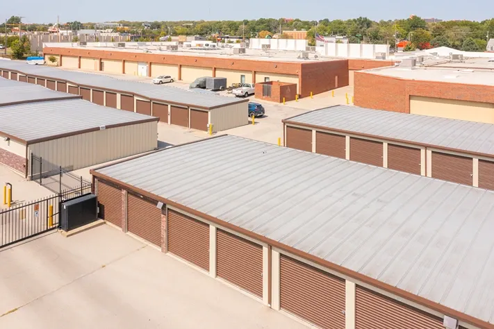 Aerial view of self storage facility with multiple rows of drive-up units and wide access lanes