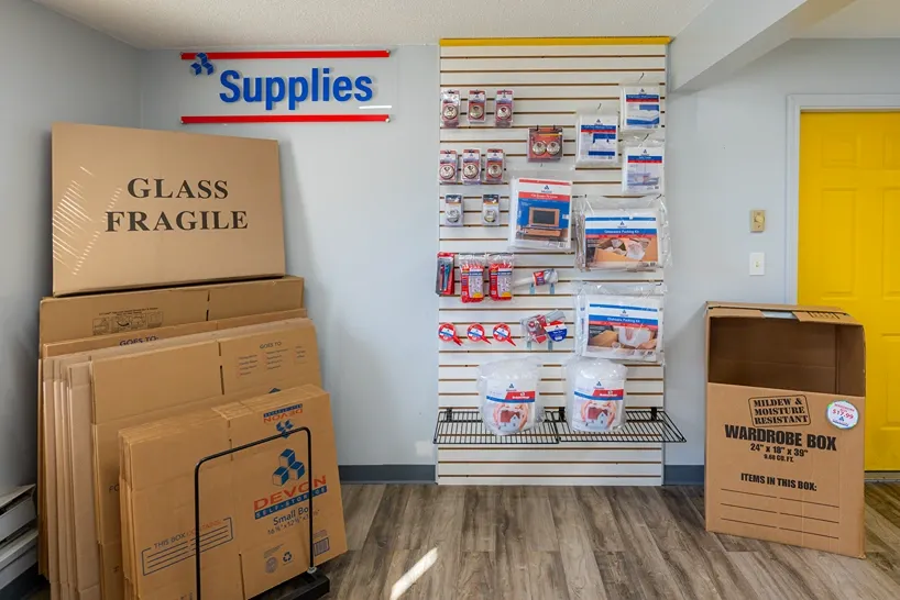 Storage units supplies on the wall at Devon Self Storage - Lambeth Park in Fairhaven, MA. Moving, packing supplies.