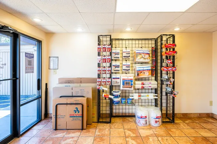 Wall of storage supplies Devon Self Storage - Two Notch Road