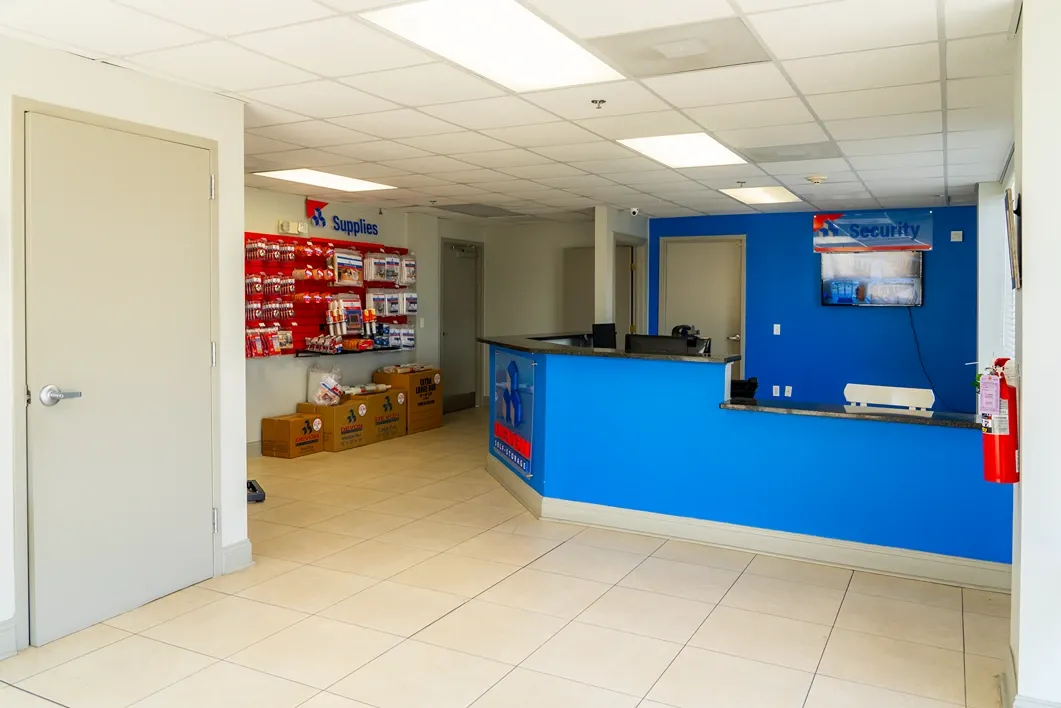 Self storage office with customer service desk and security monitoring