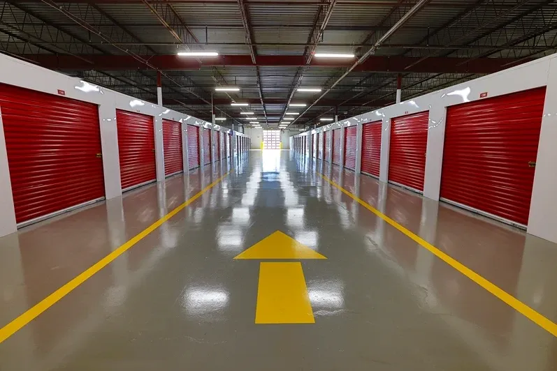 Arrow pointing the direction of driving. Wide lanes for drive thru storage Devon Self Storage - Allentown
