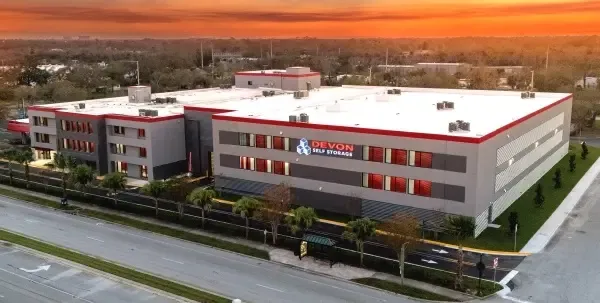 Aerial view of modern climate-controlled self storage facility near main road